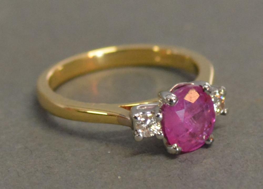 An 18ct. Yellow Gold Ruby and Diamond Ring, the ruby approximately 1.35 ct the diamond 0.15 ct