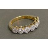 A 9ct. Yellow Gold Seven Stone Diamond Ring, approximately 0.60 ct
