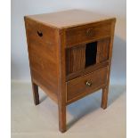 A George III Mahogany Nightstand with a tambour compartment above a drawer raised upon square legs