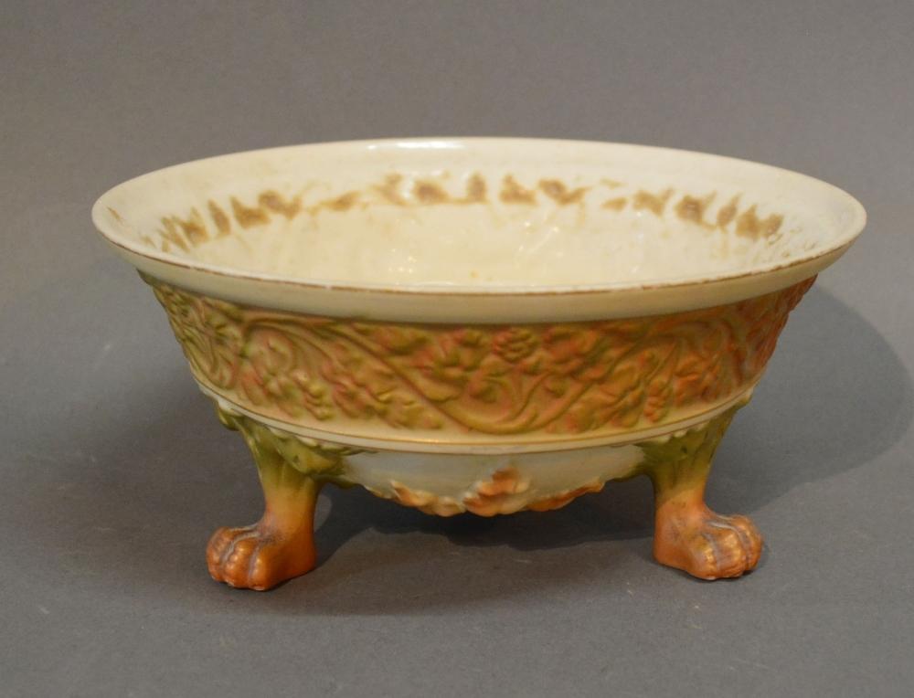 A Royal Worcester Blush Ivory Bowl decorated in relief with a continuous foliate band and raised