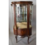 A Late 19th Early 20th Century French Marquetry Inlaid and Gilt Metal Mounted Vitrine, the