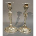 A Pair of Sheffield Silver Candlesticks in the Adams Style, 22.5 cms tall