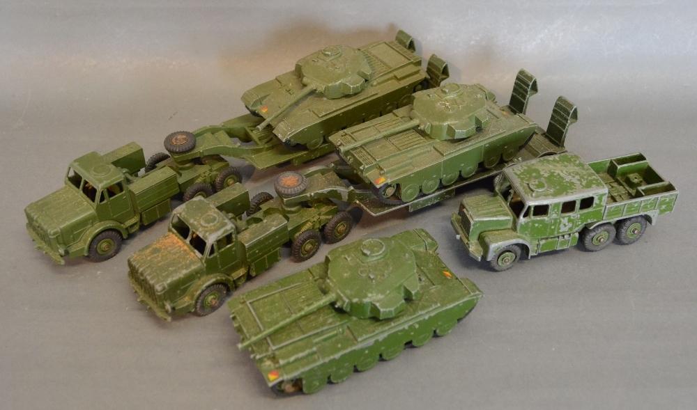 A Dinky Supertoys Tank Transporter No. 660 together with a Dinky Toys Centurion Tank No. 651 and