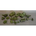 An Early Dinky Toys Tank together with another similar and a collection of Dinky Toys Military