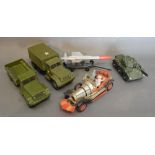 A Corgi Toys Chitty Chitty Bang Bang together with three Corgi Toys Military Vehicles and a