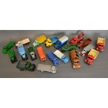 A Dinky Toys Dodge together with nineteen other Dinky Toys, all repainted