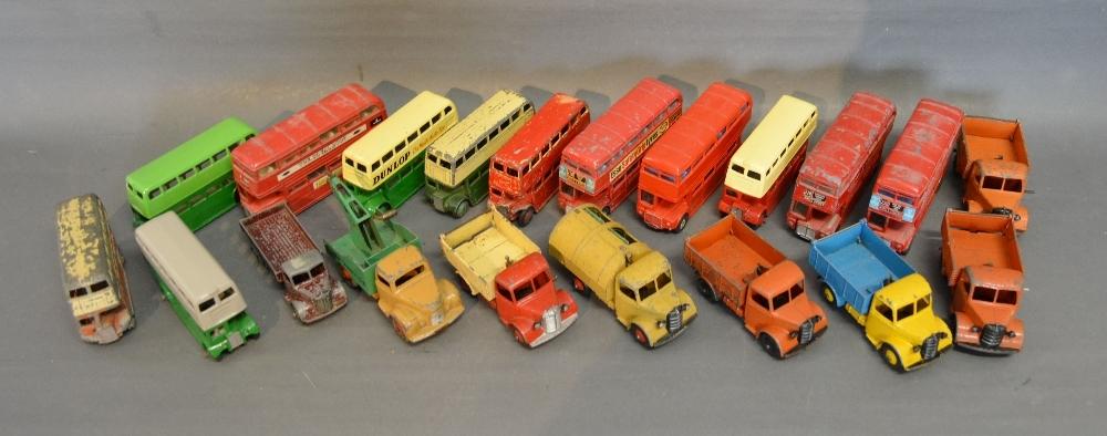 A Dinky Toys Routemaster Model of a Bus together with nineteen other similar Dinky Toys, all play