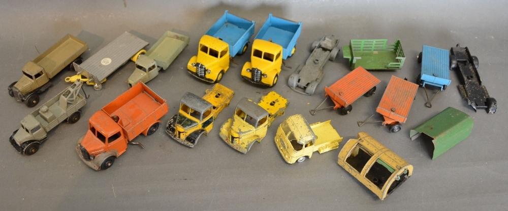 A Dinky Toys Bedford together with other play worn Dinky Toys