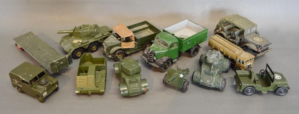 A Lone Star Armoured Car together with various other military vehicles