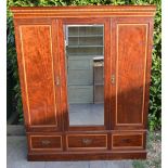 An Edwardian Mahogany Satinwood Crossbanded Three Door Wardrobe, the chequer inlaid moulded