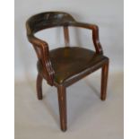 A Mahogany and Leather Upholstered Office Armchair, the button upholstered back above a stuff over
