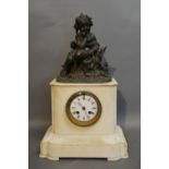 A 19th Century French White Marble Mantle Clock surmounted with a patinated figure of a Young