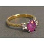 An 18ct. Yellow Gold Ruby and Diamond Ring, the ruby approximately 1.35 ct the diamond 0.15 ct
