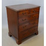 A 19th Century Mahogany Commode Chest, the moulded top above a fall front simulated as two drawers