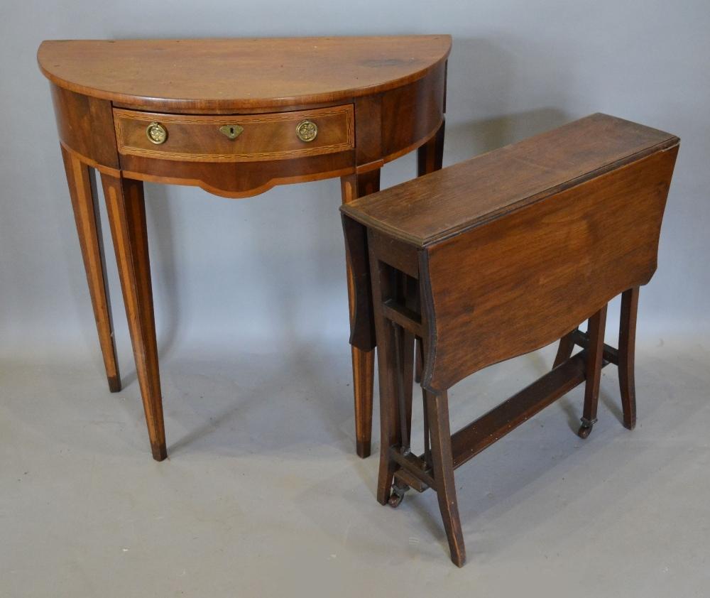 A 19th Century Mahogany Demi-Lune Side Table with a frieze drawer raised upon square tapering legs