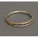An 18ct. White Gold Diamond Set Half Eternity Ring