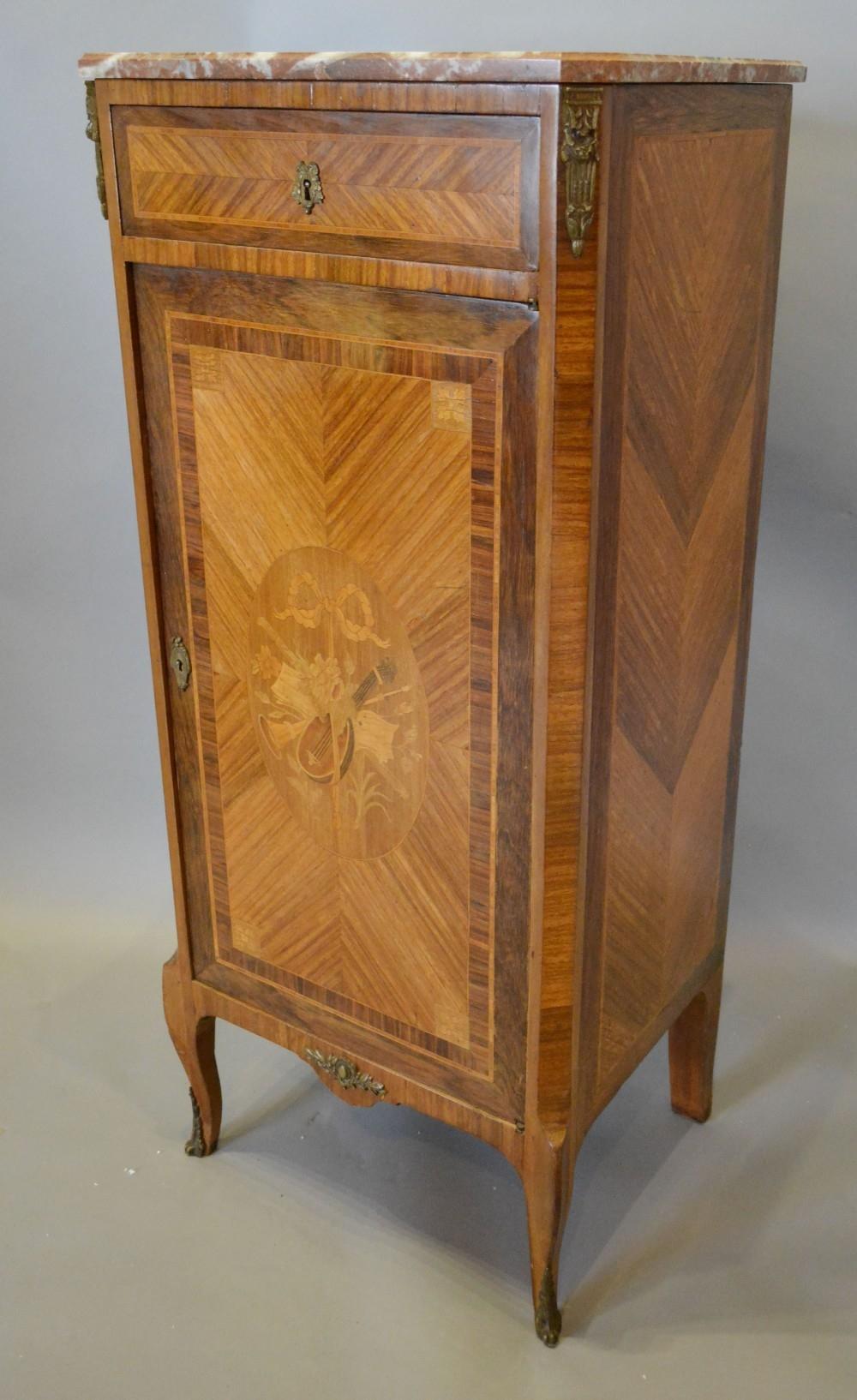 A French Kingwood and Marquetry Inlaid Side Cabinet with a Rouge Marble top above a frieze drawer