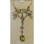 A Diamond and Peridot Pendant