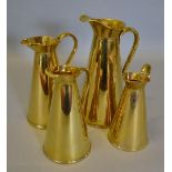 A Set of Four Brass Measures by J.S. & S. ranging from 22 to 34 cms