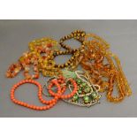 A Coral Bead Necklace together with a collection of other similar necklaces