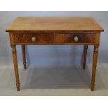 A 19th Century Mahogany Side Table, the crossbanded top above two frieze drawers with brass knob