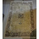 A Chinese Silk Work Rug with a central medallion within multiple borders, 185 x 123 cms