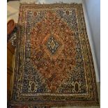 A North West Persian Woollen Large Rug with a central medallion within an all over design upon a