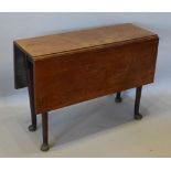 A 19th Century Mahogany Drop Flap Dining Table, the rectangular drop flap top above turned