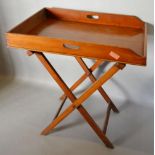 A 19th Century Mahogany Butlers' Tray on Folding Stand