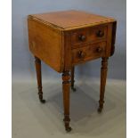 A 19th Century Mahogany Drop Flap Work Table with two drawers, raised upon turned tapering legs with