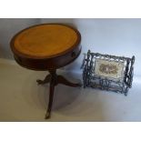 A Mahogany Drum Table, the leather top above an arrangement of drawers with turned centre column and