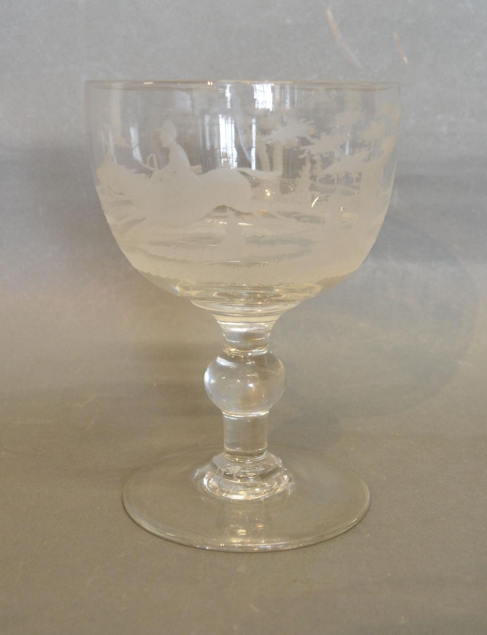 An 18th Century Large Drinking Glass, the bowl engraved with a continuous band depicting a Hunting