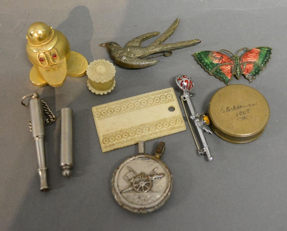 An Acme Whistle, together with a collection of other items to include a Lighter, two Bone Sewing