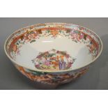 A 19th Century Chinese Export Porcelain Bowl decorated in polychrome enamels with figures, 28 cms