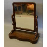 A Victorian Mahogany Swing Frame Toilet Mirror with serpentine base