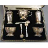 A George V Silver Five Piece Cruet Set within fitted lined case, Birmingham 1915 by Elkington & Co.