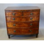 A Victorian Mahogany Bow Front Chest, the moulded top above two short and three long drawers with