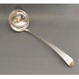 An Irish Silver Large Ladle (marks rubbed), 36cms long