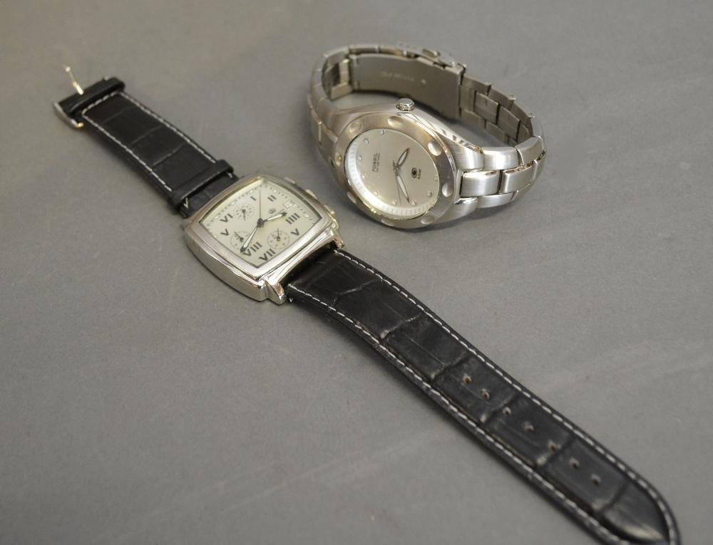 A Fossil Stainless Steel Gentlemen's Wrist Watch together with a King Quartz Gentlemen's Wrist Watch