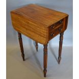A Victorian Mahogany Drop Flap Work Table, the moulded drop flap top above two drawers opposed by