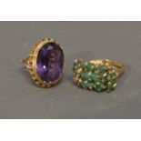 A 9ct. Gold Dress Ring set large oval Amethyst together with another similar dress ring