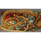 A Collection of Costume Jewellery to include two coral bracelets, various necklaces, pendants