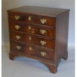 A 19th Century Mahogany Straight Front Chest, the moulded top above four long drawers with brass