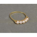 A 14ct. Yellow Gold Pearl Set Ring set with five pearls