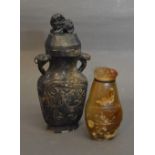 A Late 19th Early 20th Century Chinese Snuff Bottle together with a similar soapstone covered vase