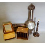 A Carved Oak Barometer Thermometer together with a Barley Twist Table Lamp and three other items