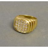 An 18ct. Gold Diamond Set Signet Ring set with five rows of diamonds