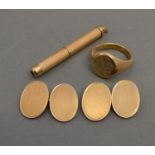 A 9ct. Gold Signet Ring together with 9ct. gold cuff links and a 9ct. gold toothpick, 31.2 gms