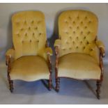 A Victorian Mahogany Drawing Room Armchair with button upholstered back raised upon turned legs,