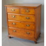 A Victorian Burr Walnut Straight Front Chest of two short and three long drawers with brass